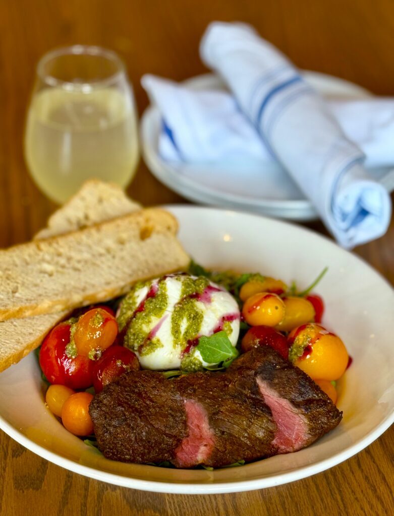 Burrata Caprese with Hanger steak & prosecco