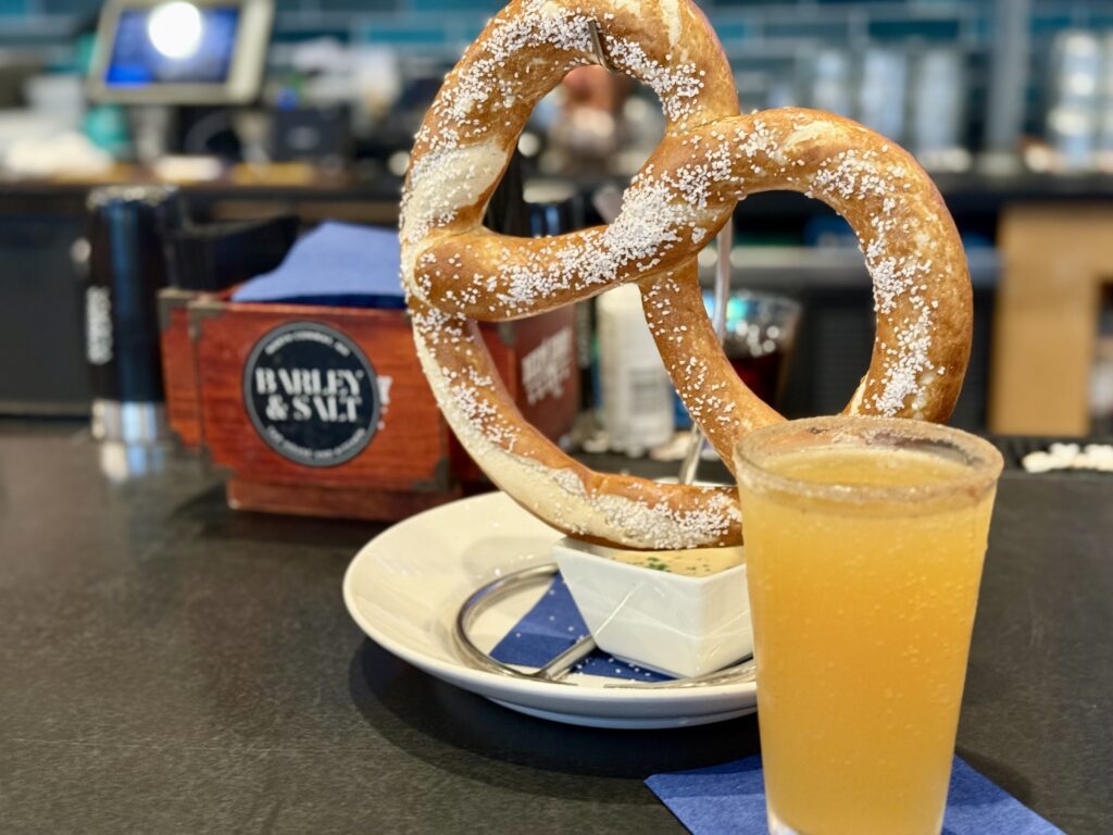 big pretzel with downeast cider donut with cinnamon sugar rim